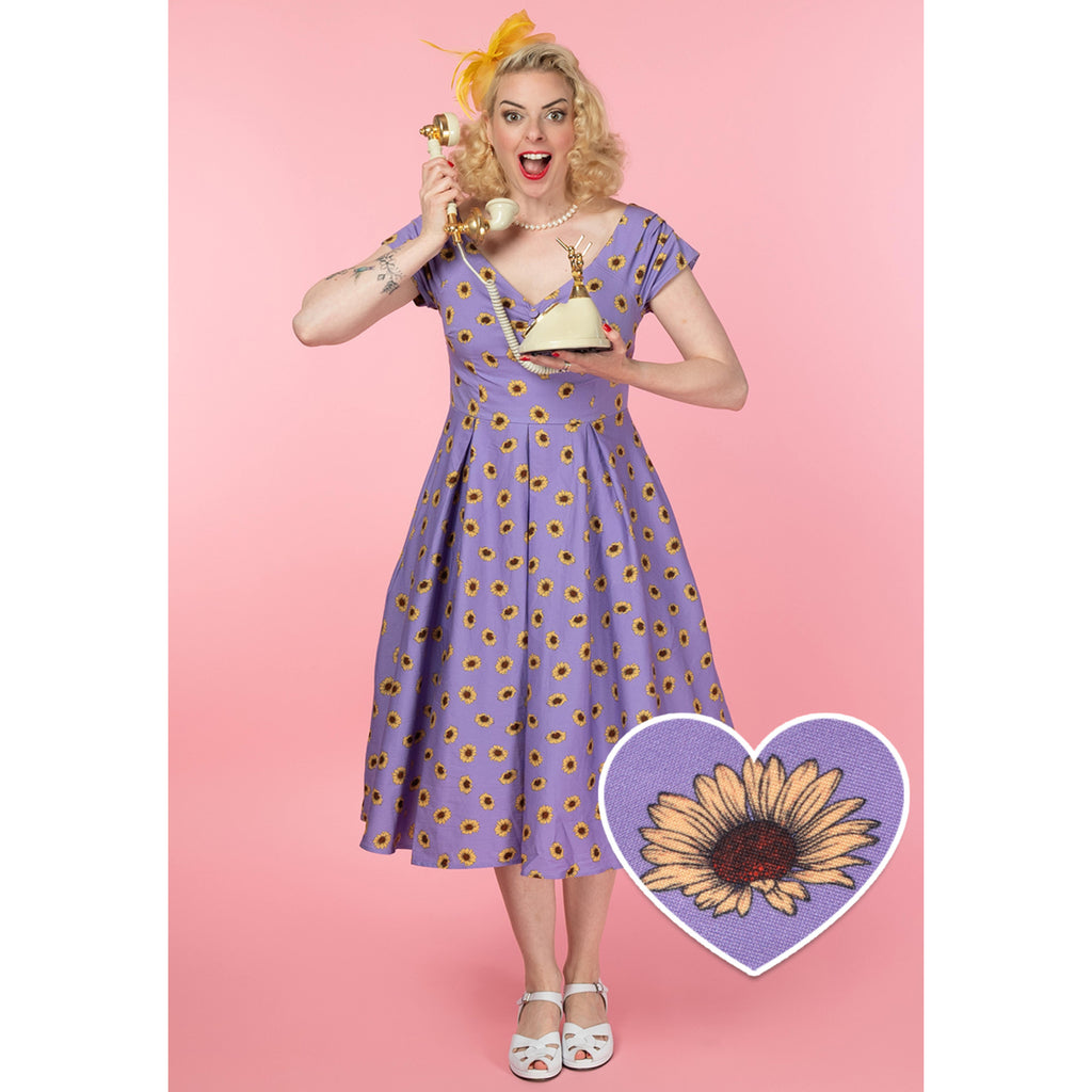 purple sunflower dress Felt like a princess in this beautiful sunflower field wearing this lilac romper from @exlura_official (gifted) Purple and yellow is one of my favorite color combinations for summer, and this outfit